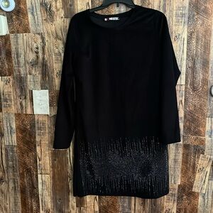 Sonesta women's black dress with stones in the front size small.